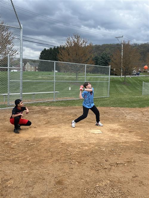 Student holding bat